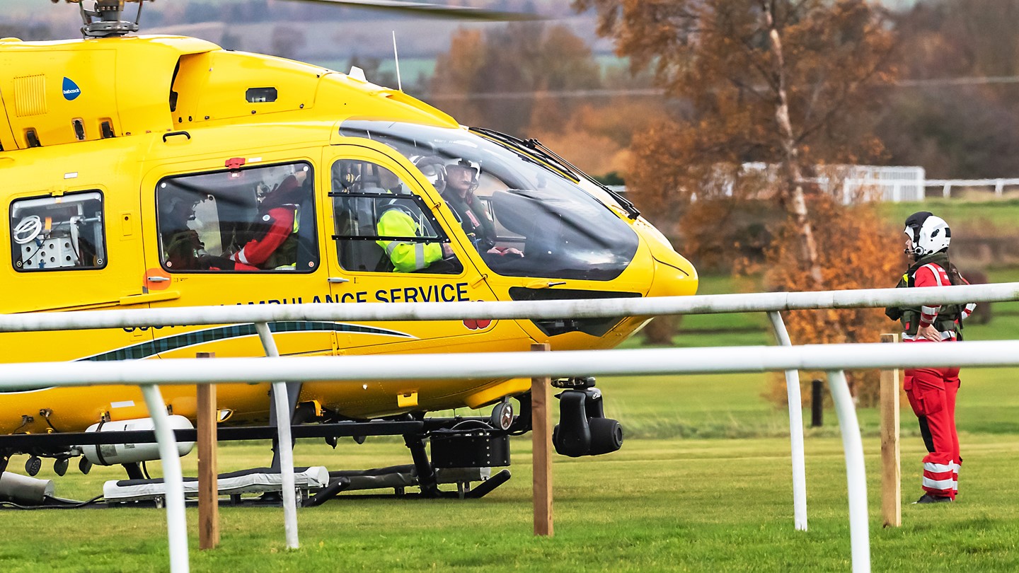 An Air Ambulance helicopter at a race course