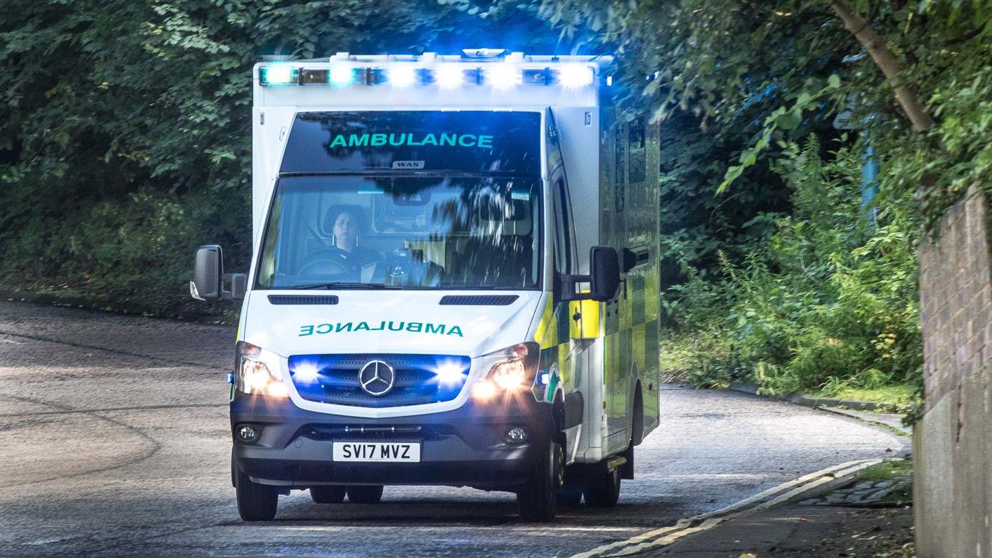 An A&E ambulance going to an emergency