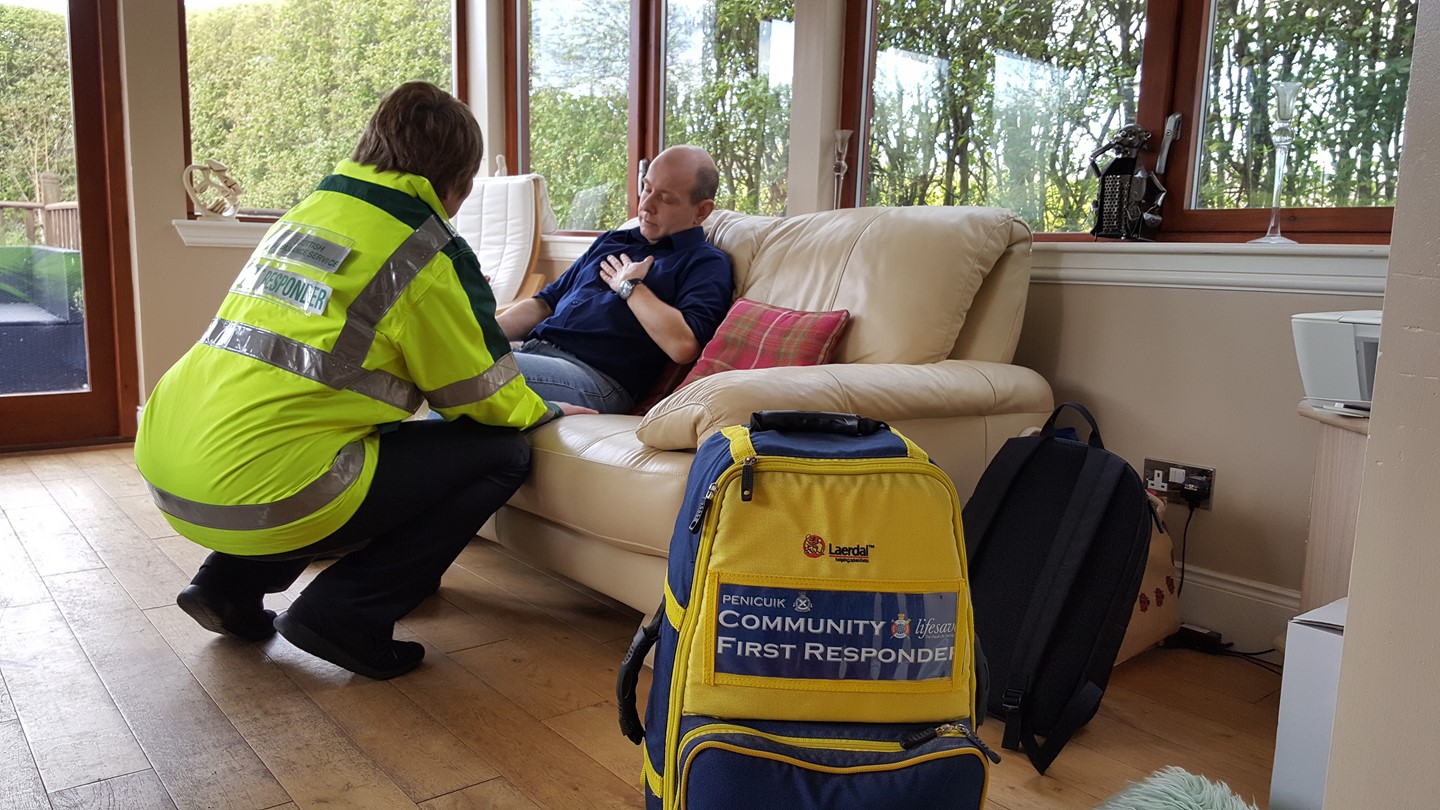 A Community First Responder treats a patient