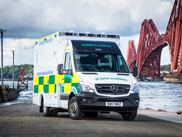 An A&E ambulance in front of the Forth Railway Bridge