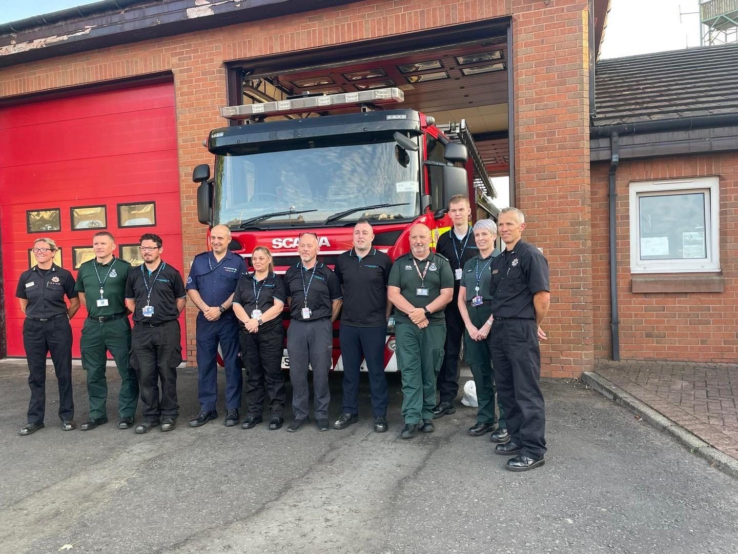 A group of eleven people including Community First Responders, SAS Community Resilience and Scottish Fire and Rescue staff