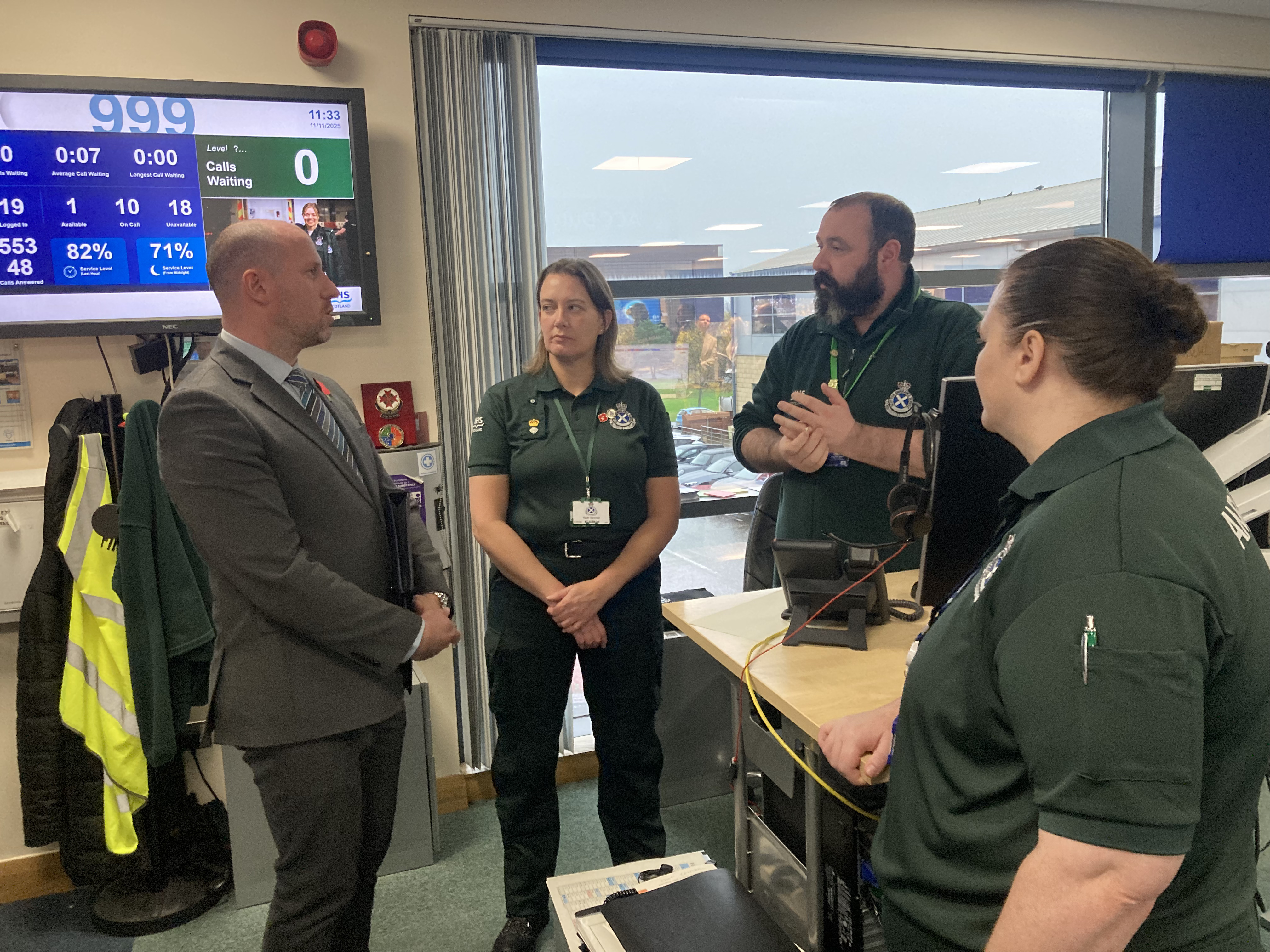 Health Secretary Neil Gray speaks to ACC staff in uniform about the winter pressures