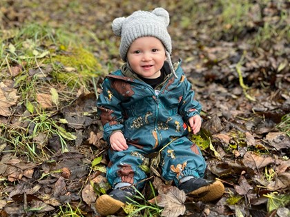 Picture of Jackson sitting in leaves