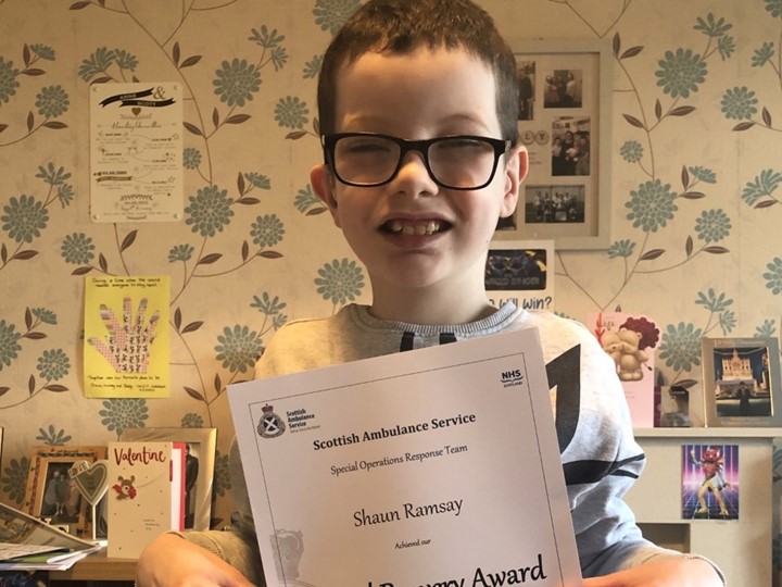Shaun Ramsay with his certificate