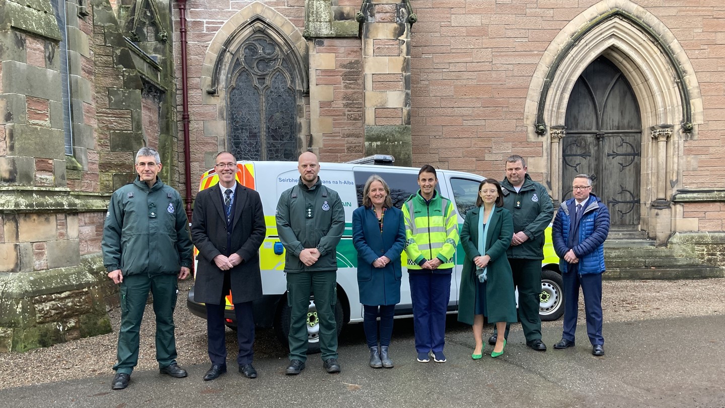 Photo of SAS staff members in front of a mental health vehicle