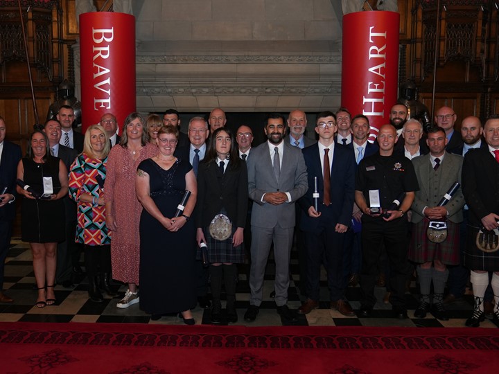 Group photo of attendees at the Brave@Heart awards including Hamza Yousef