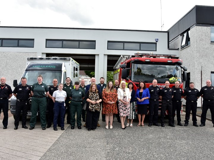 Staff and vehicles in front of Clarkston station