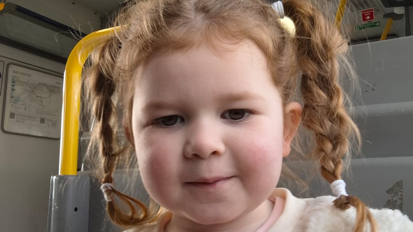 Picture of Amelia inside an ambulance, no expression