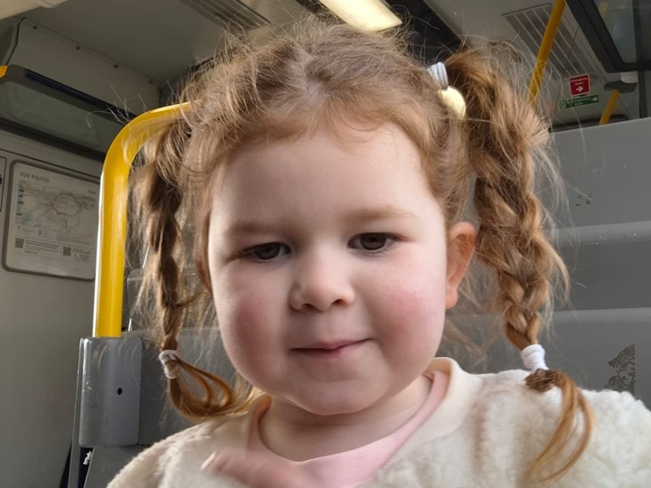Picture of Amelia inside an ambulance, no expression