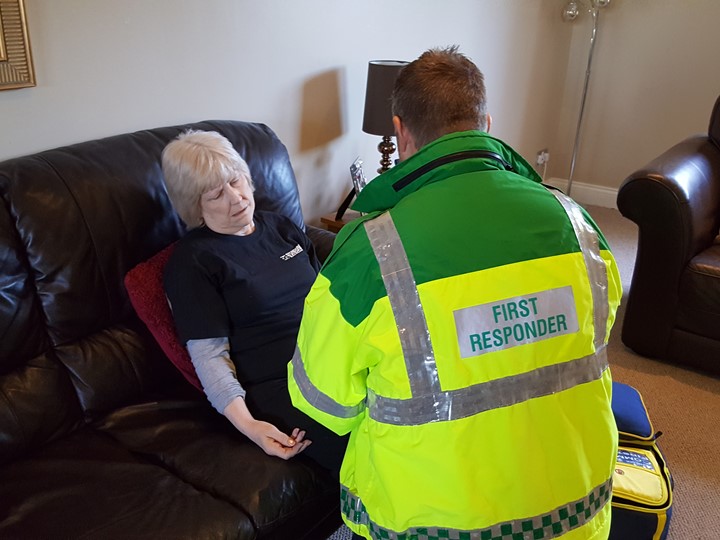 A Community First Responder treats a patient who has had a stroke