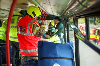 Shot inside the double decker bus showing emergency service staff during a mock exercise