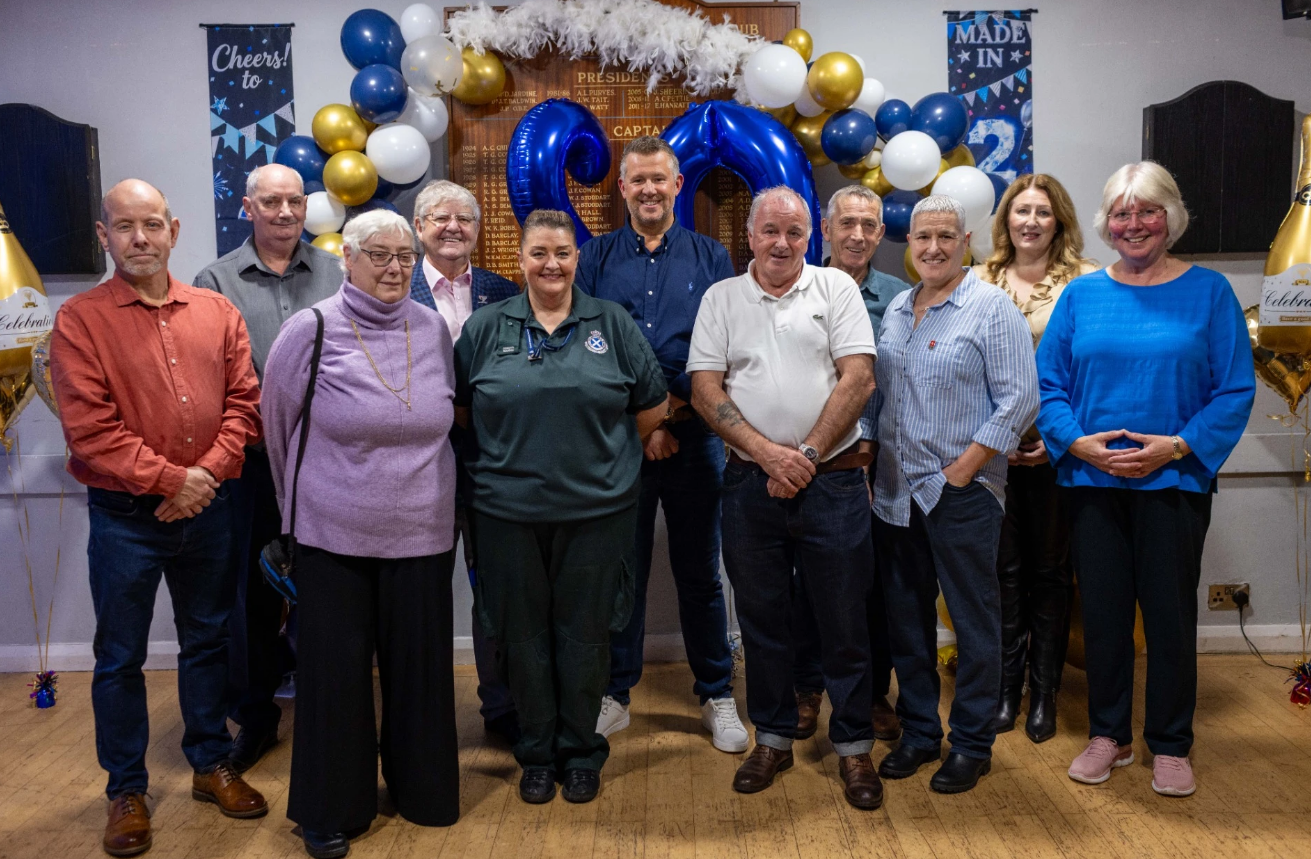 A group of 11 people including SAS staff and Penicuik Community First Responders past and present.